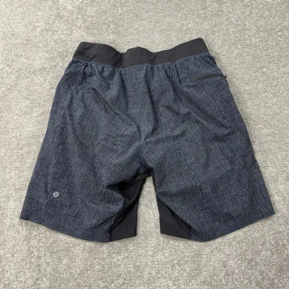 Lululemon Mens M THE Short Lined Training Running Short Black Pattern Zip Pocket